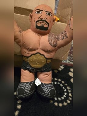 The Rock Plush Wrestling Figure with Championship Belt - Black & Tan